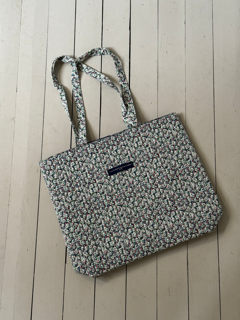 Rhodes net med blomster - grøn/hvid/rød