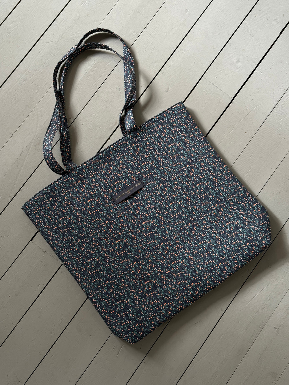 Rhodes net med blomster - navy/grøn