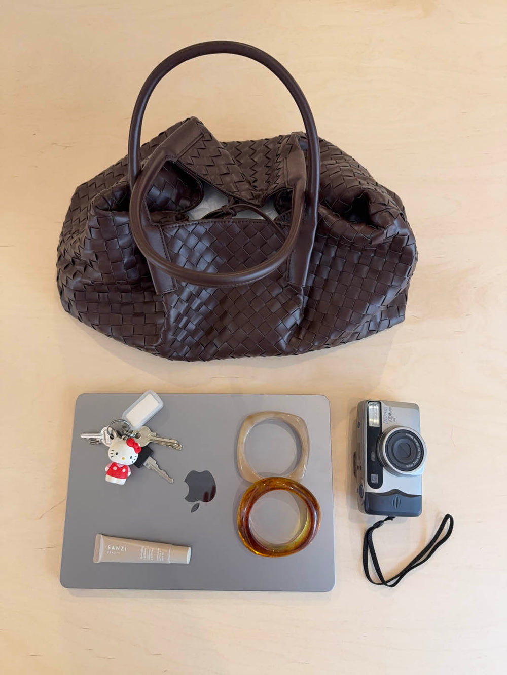 Milu skuldertaske i flet - Brun