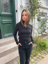Margaret turtlenck bluse med åben ryg - Sort