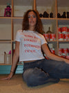 "Sorry if I looked interested, I'm not" baby tee - Hvid