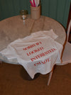 "Sorry if I looked interested, I'm not" baby tee - Hvid