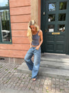 Alaia lavtaljet jeans med lyn detalje - Lys denim