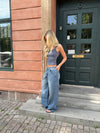 Alaia lavtaljet jeans med lyn detalje - Lys denim