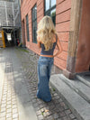 Alaia lavtaljet jeans med lyn detalje - Lys denim