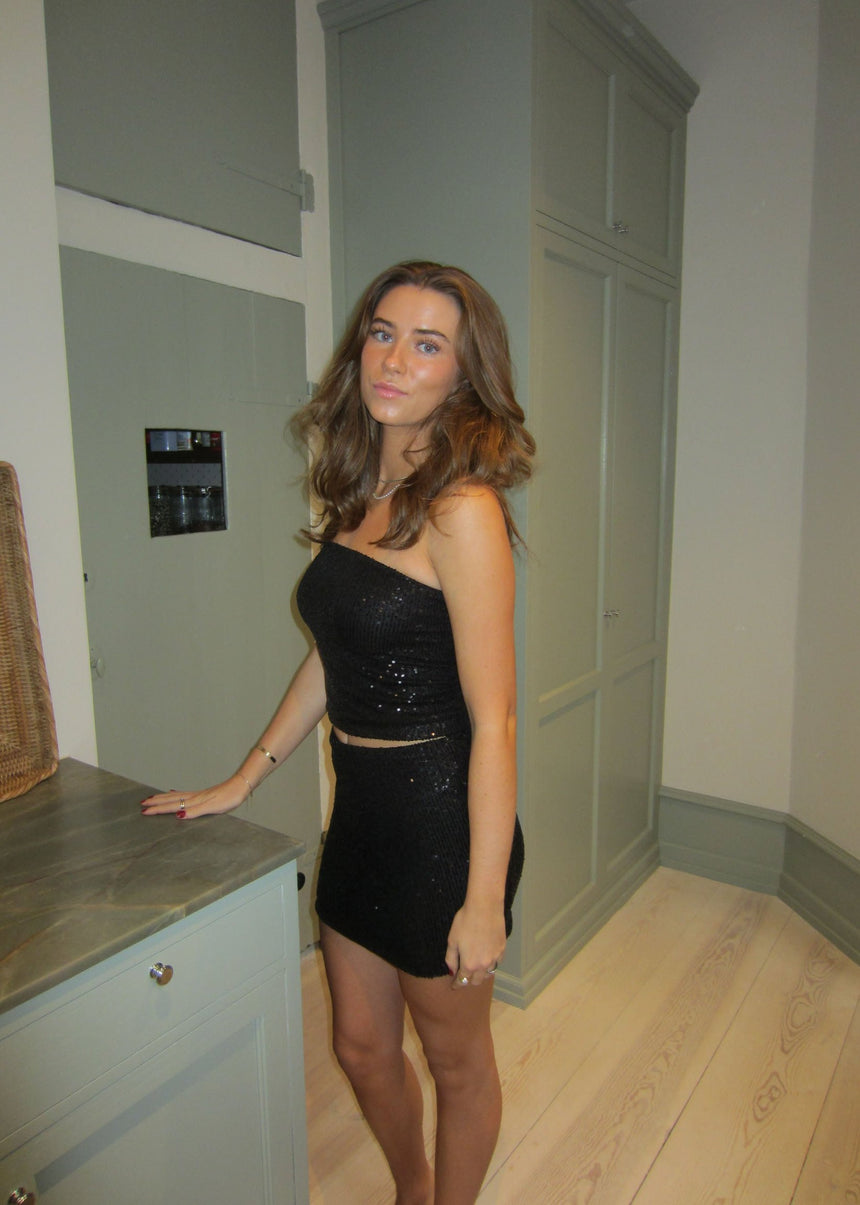 Jolie tube top med pallietter - Sort