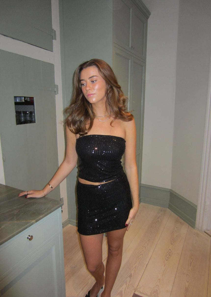 Jolie tube top med pallietter - Sort