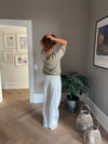 Alaia lavtaljede jeans med lyn detalje - Hvid denim