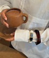Armbånd med striber - Sort/blågrå/hvid/guld