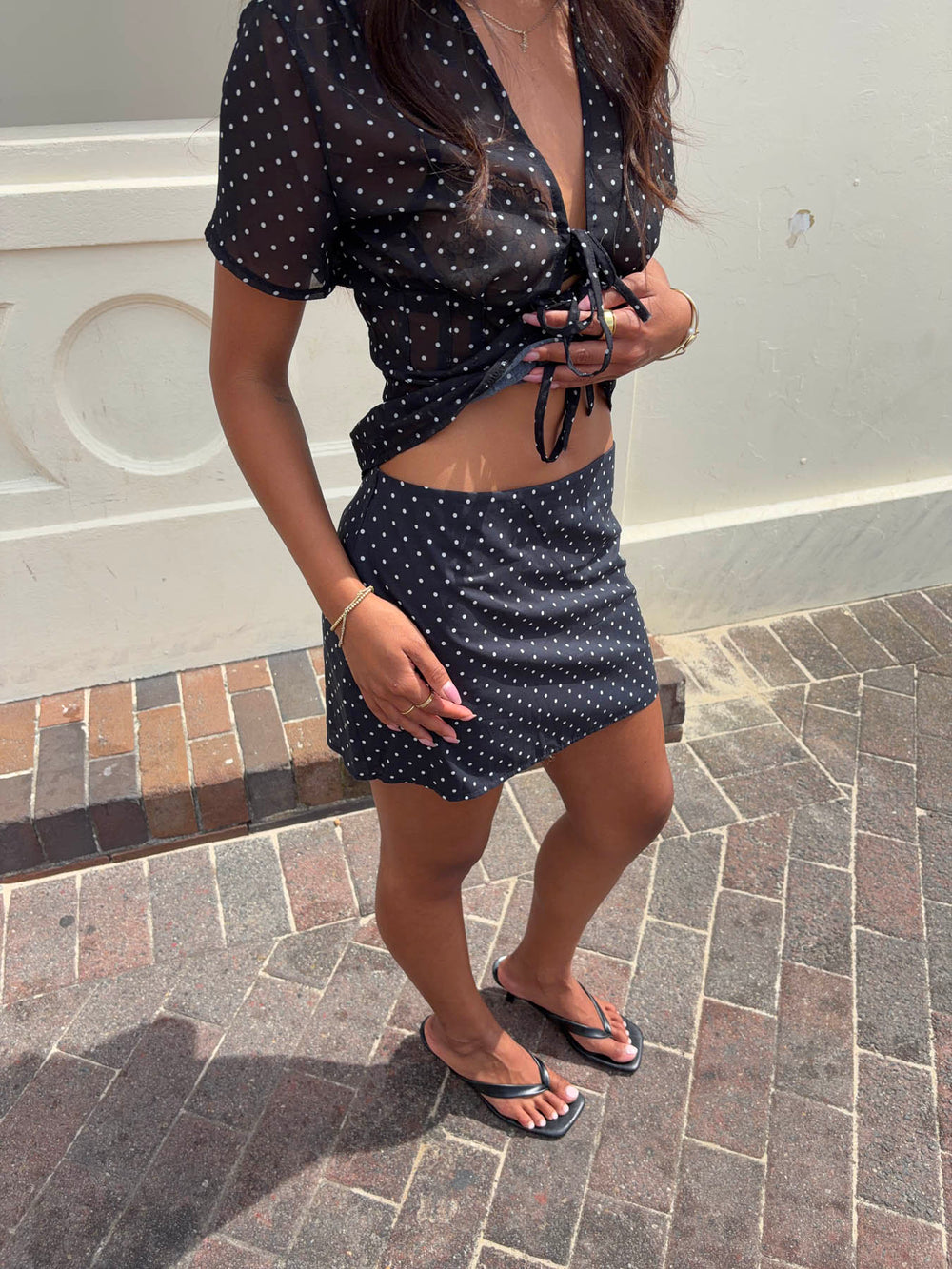 Sullivan mininederdel med polkaprikker - Sort/hvid