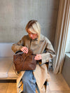 Janice skuldertaske i flet - Brun