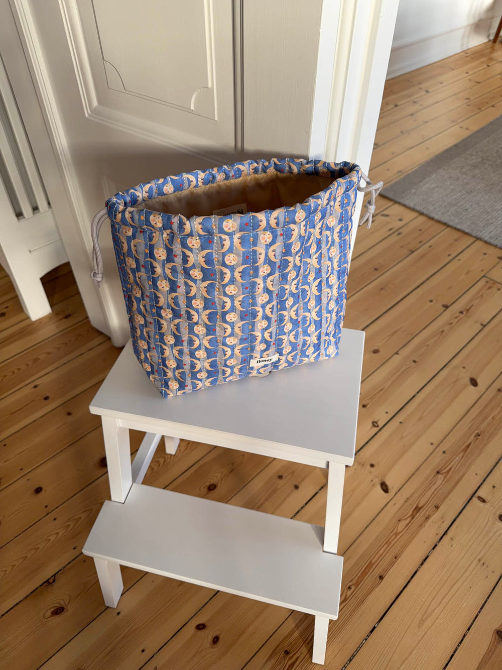 Honey toilettaske med sol og måneprint - Blå/gul