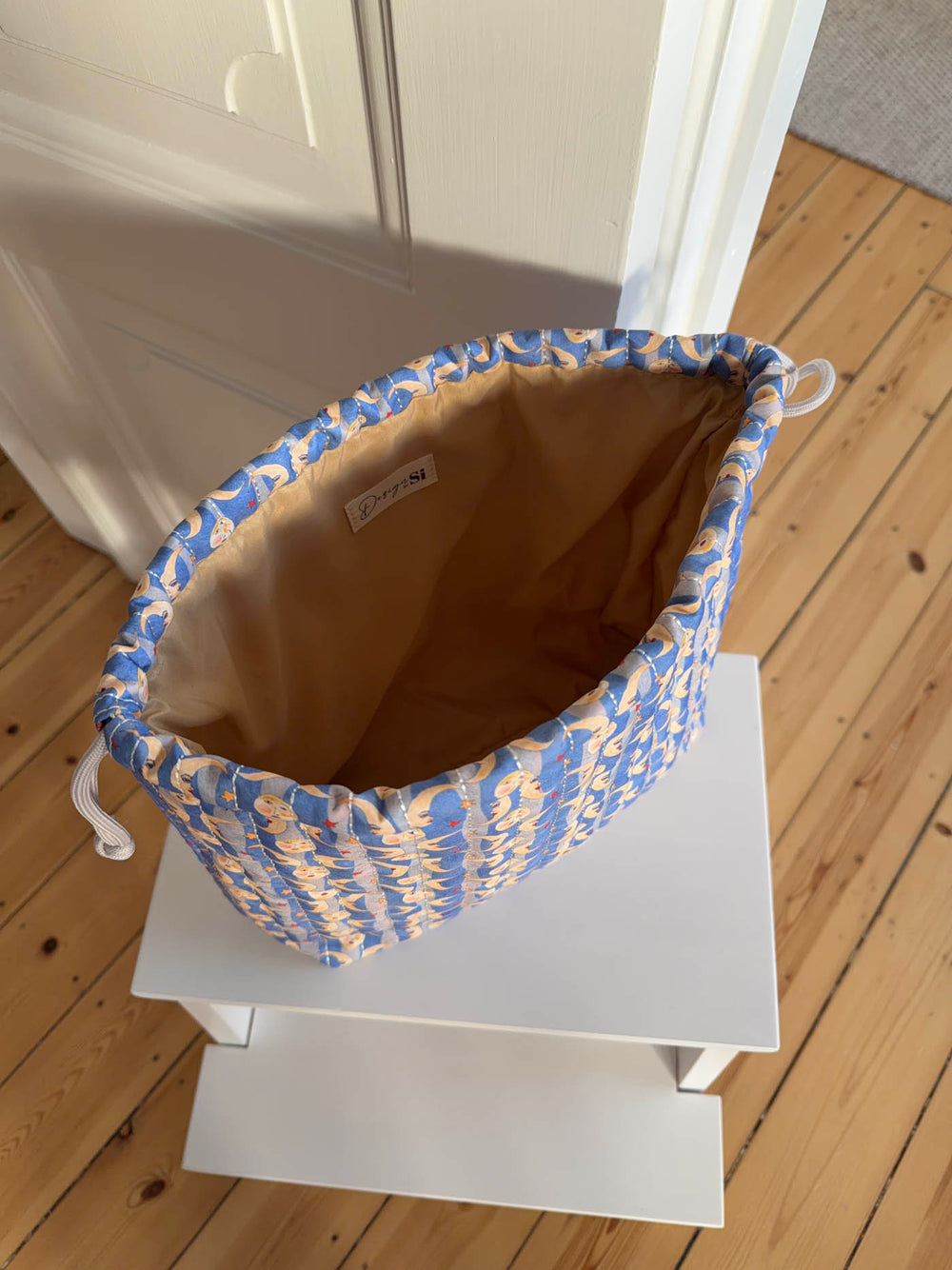 Honey toilettaske med sol og måneprint - Blå/gul