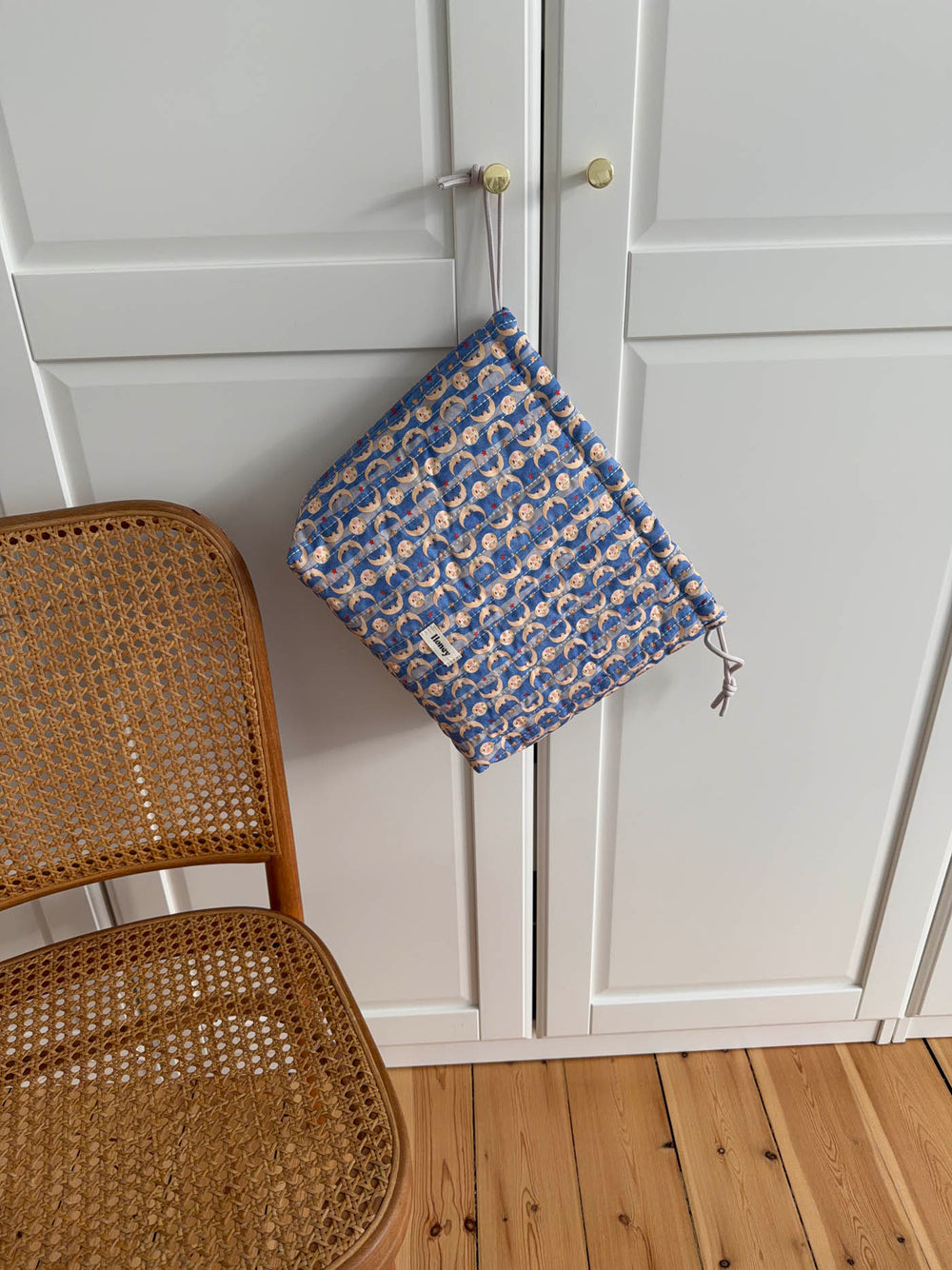 Honey toilettaske med sol og måneprint - Blå/gul